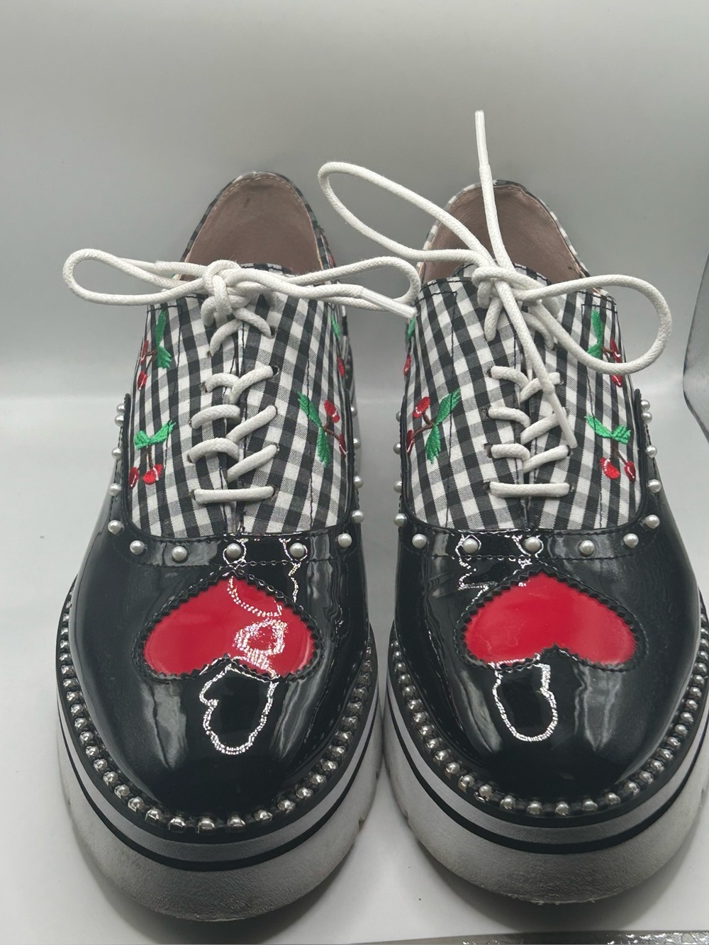 Betsy Johnson’s Black Patent Platform Oxfords with Red Heart and